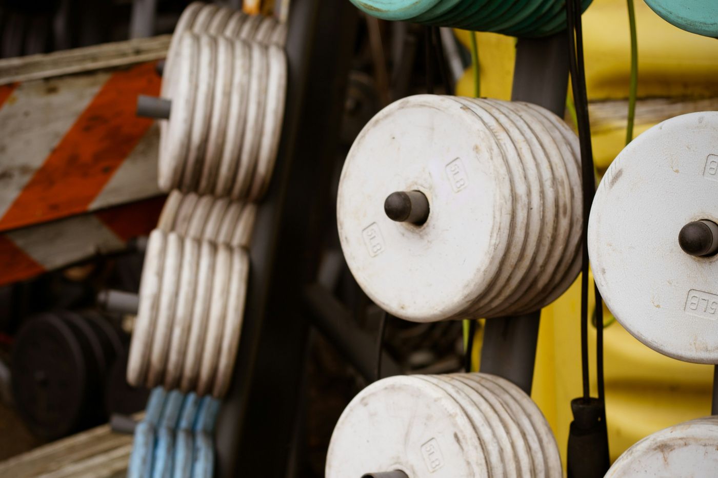 A rack of weight plates in a gym